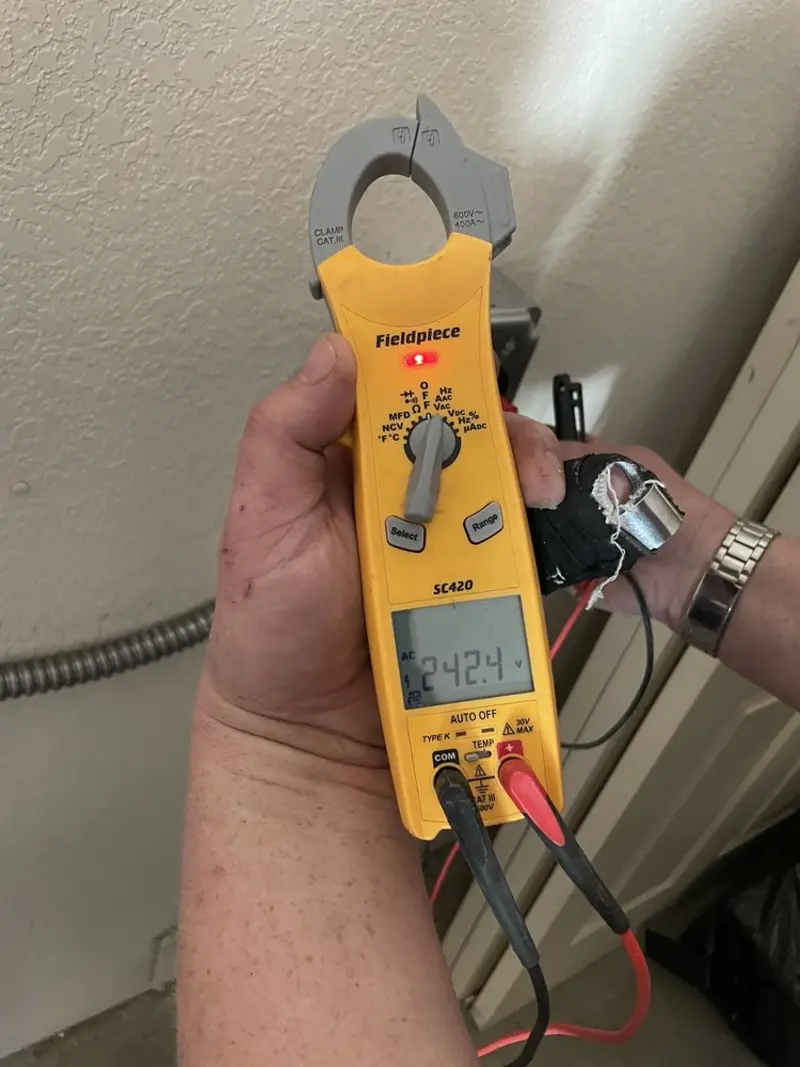Voltage testing with clamp meter during Hot Tub / Pool Electrical Wiring in Amberley